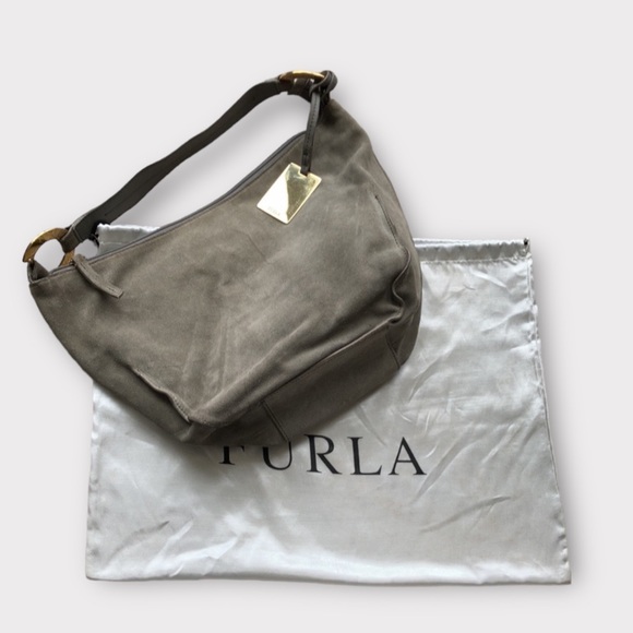 Furla Handbags - Furla hobo bag with gold tone metal accessories.